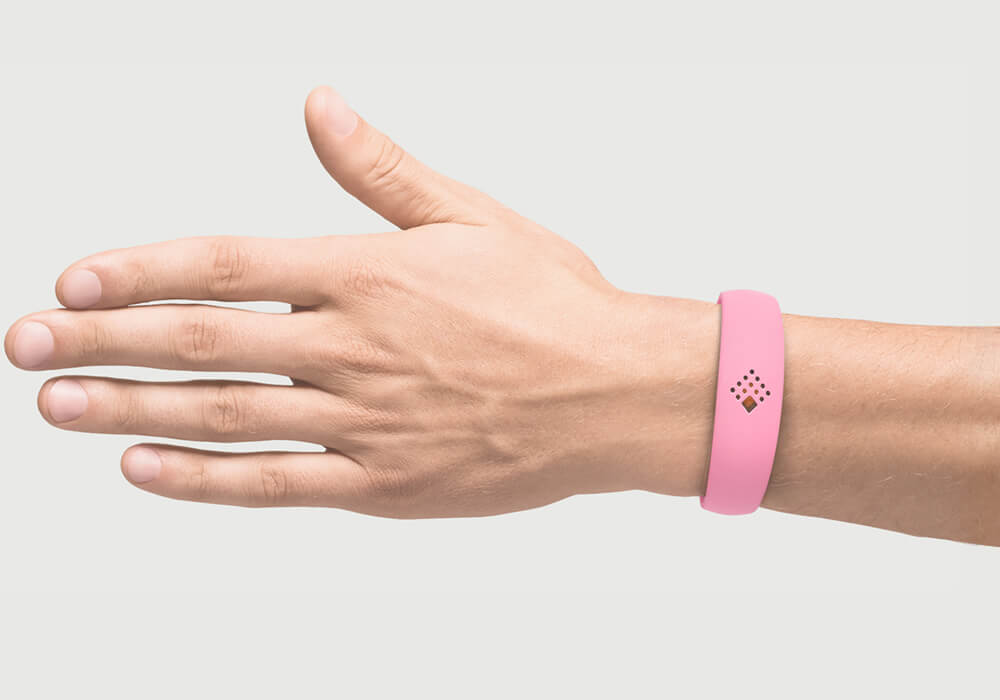 Pink AMBRIO bracelet on the hand of a man for mobile