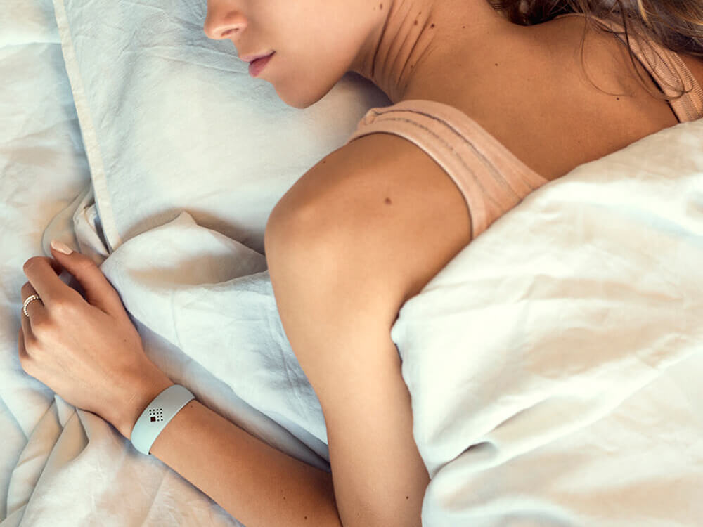 The lady wears her chic AMBRIO bracelet while sleeping